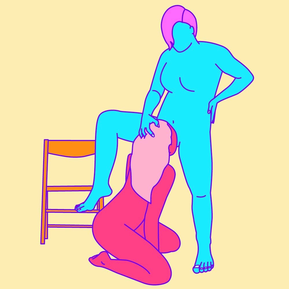 A naked illustrated couple; one is knelt on the floor by their partner's crotch. The other is stood with legs open and one leg perched on a chair.